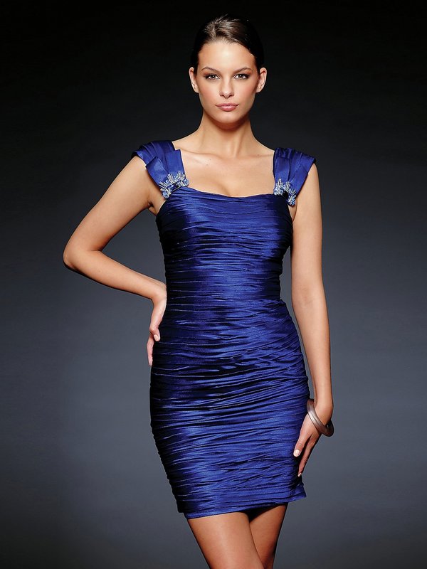 Girl in a blue satin cocktail dress Girl in a blue satin cocktail dress