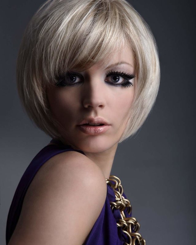 Girl with a bob-car and a slanting bang