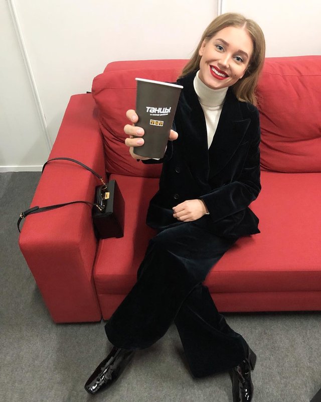 Christina Asmus in a velvet black suit