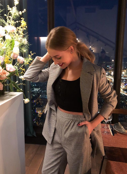 Christina Asmus in a suit of a man's cut