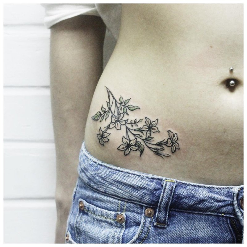 Floral tattoo on the hip