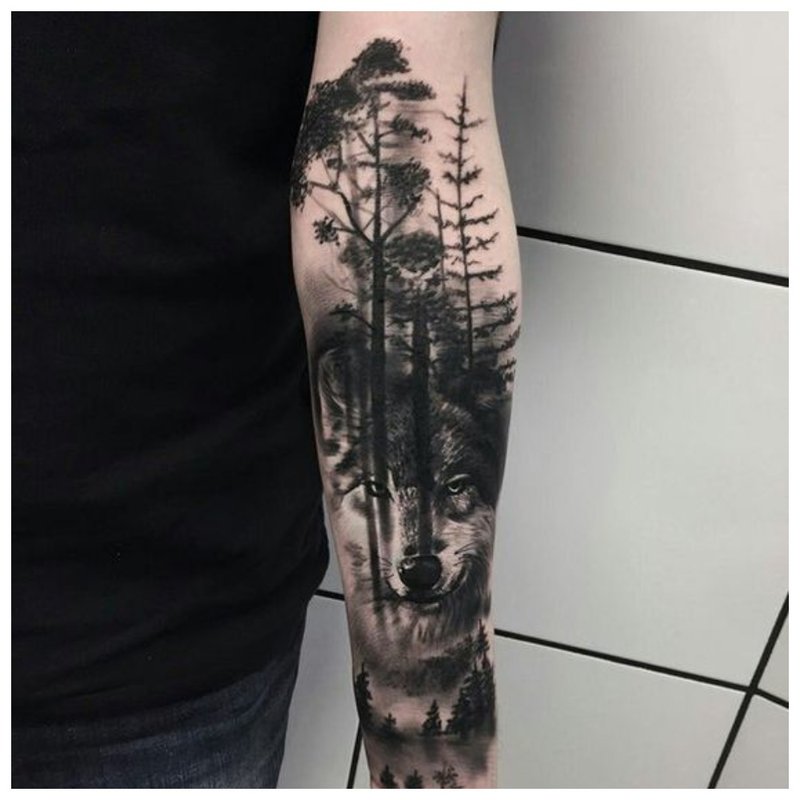 Wolf and forest landscape - tattoo man