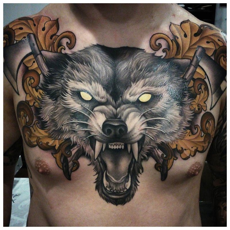 Angry wolf - tattoo on the whole chest of a man